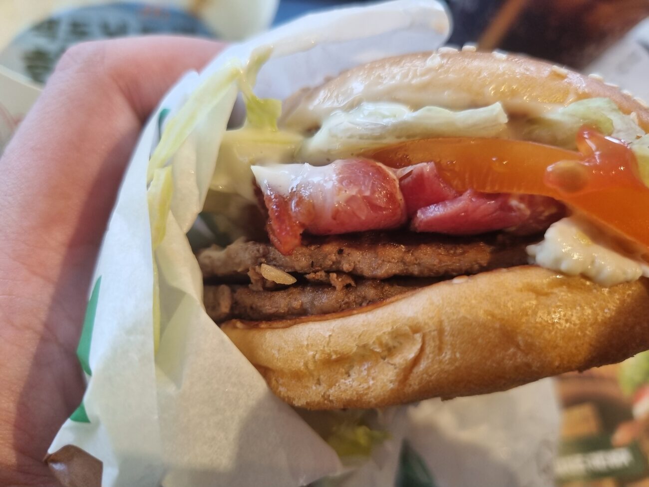 McDonalds Jinju pepper burger cross section bacon tomato two patties