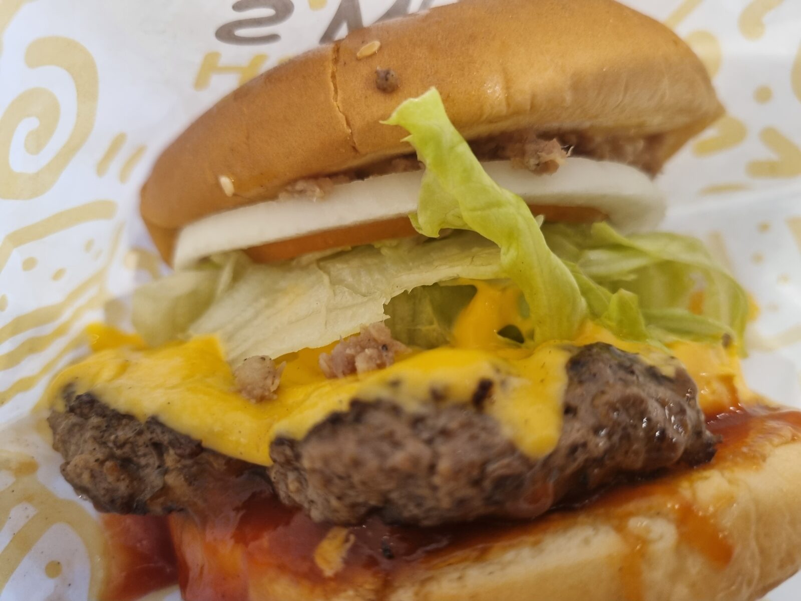 Smoky Smash Burger close up showing wagyu patty melted cheese and meat crumble