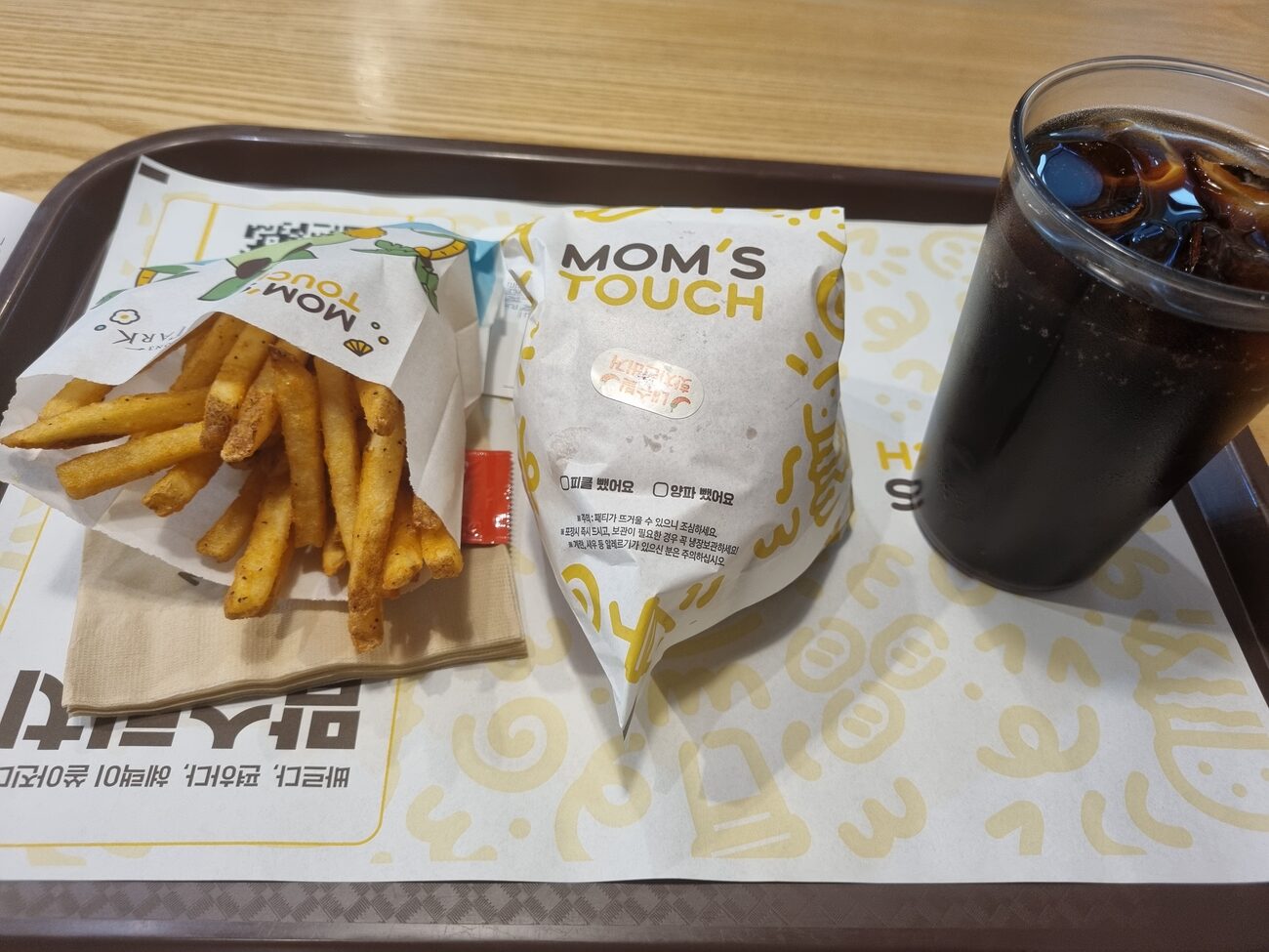 Mom's Touch Nashville hot chicken burger set tray with fries and cola