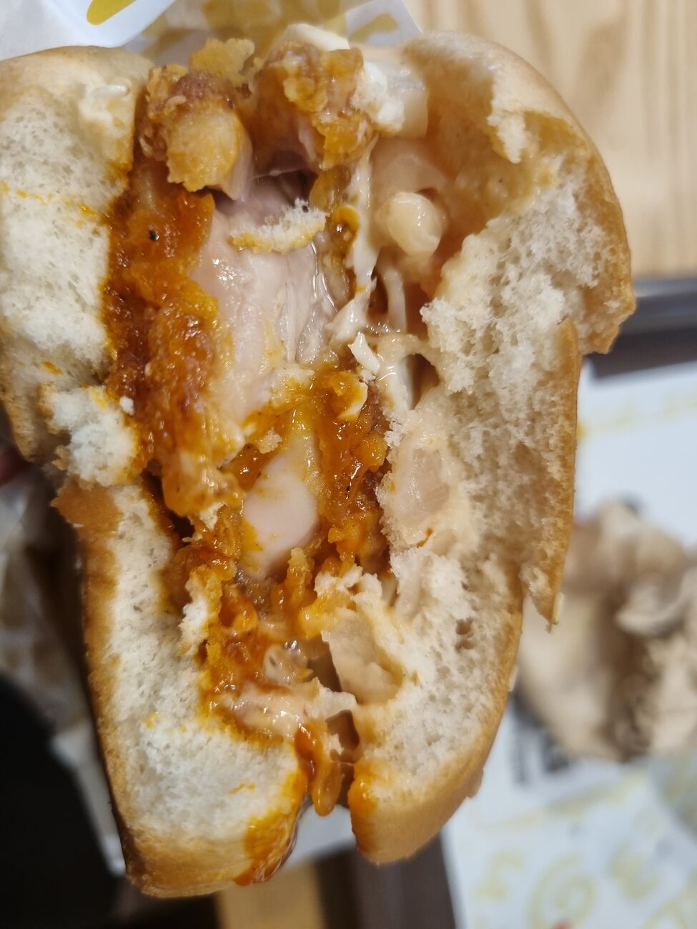 Mom's Touch Nashville hot chicken burger cross section whole chicken thigh