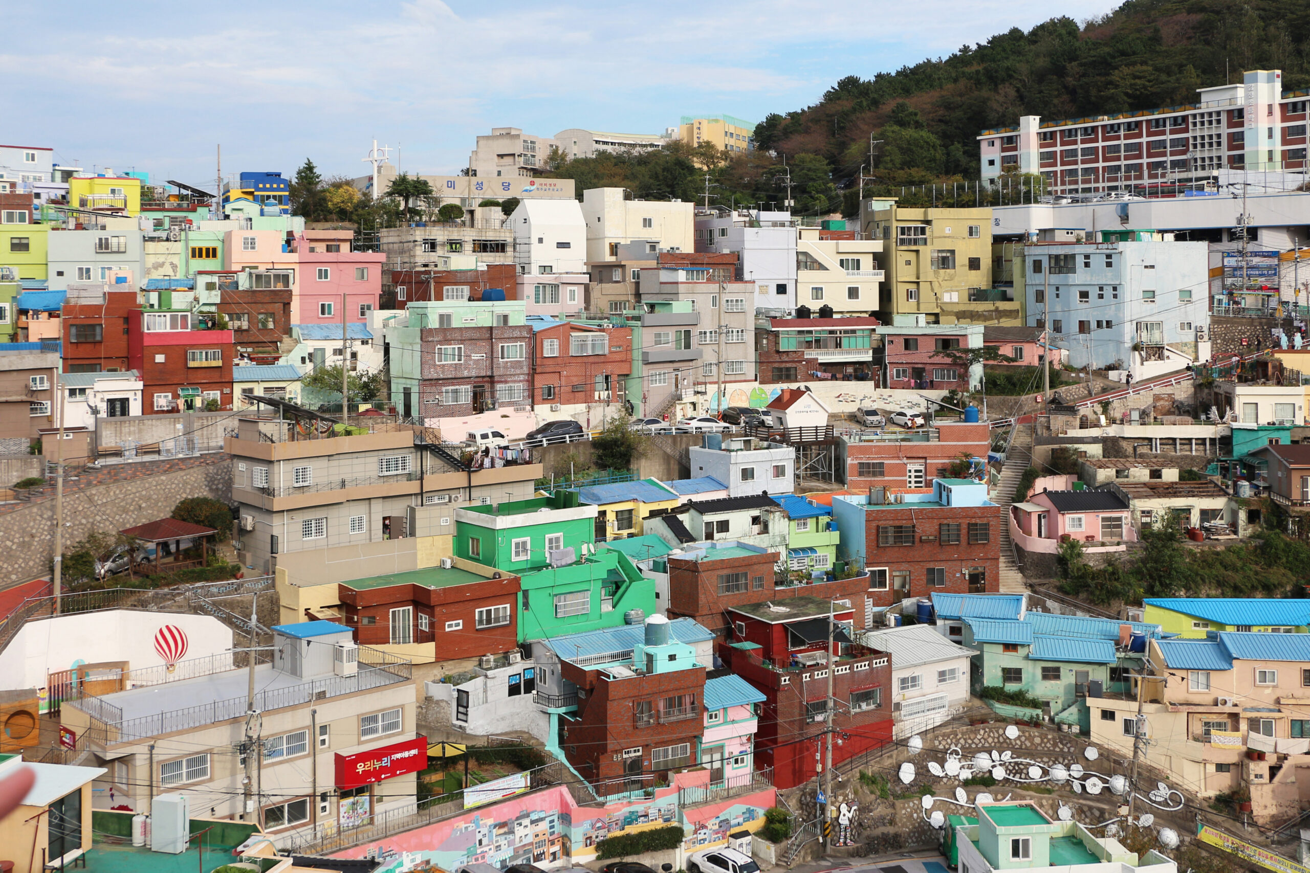 Colourful houses stacked up a hillside in Gamcheon, Busan