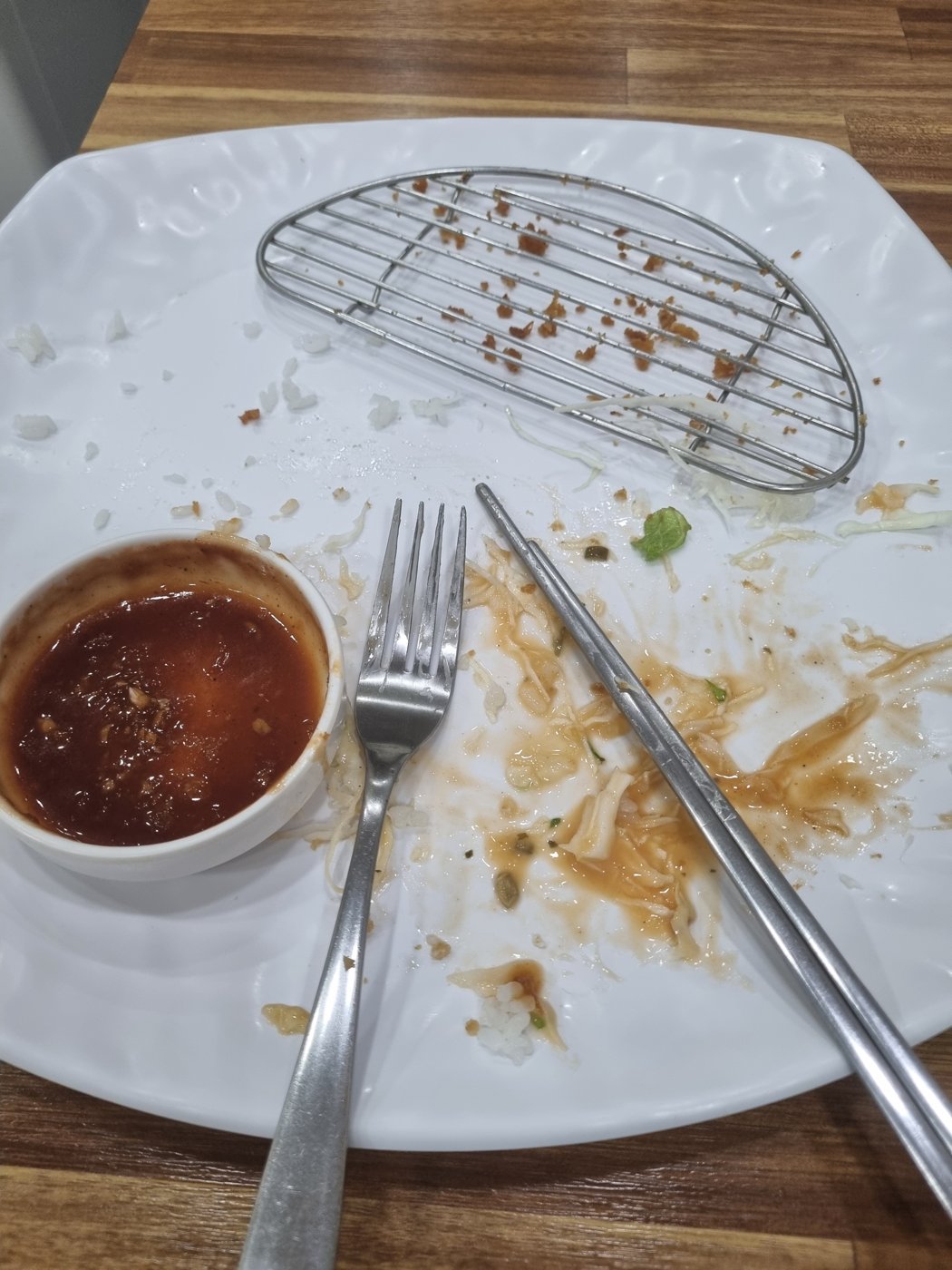 An empty plate with only sauce left