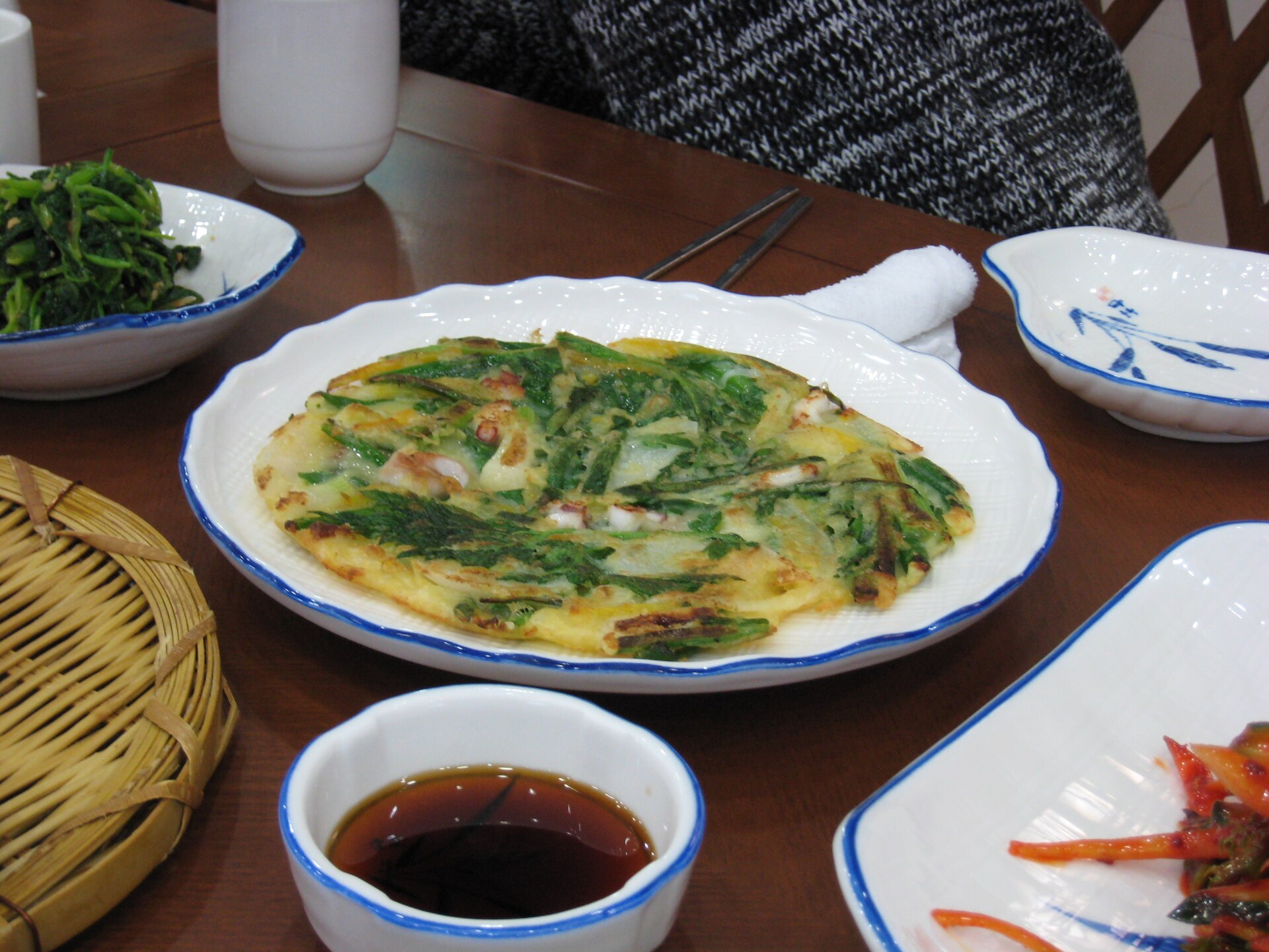 A thick scallion and seafood pancake